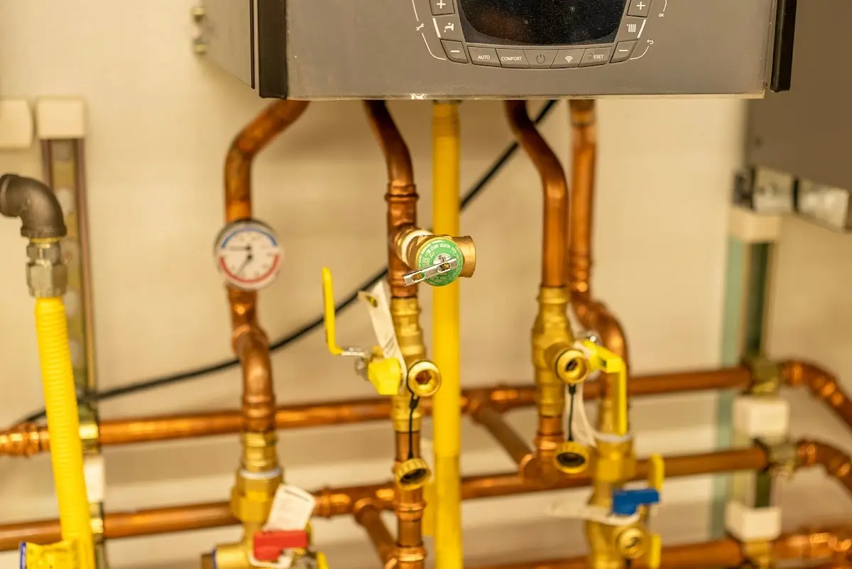 Licensed technician providing Water Heater Installation for a homeowner in Peninsula